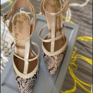 Snake print pumps. Used it once
